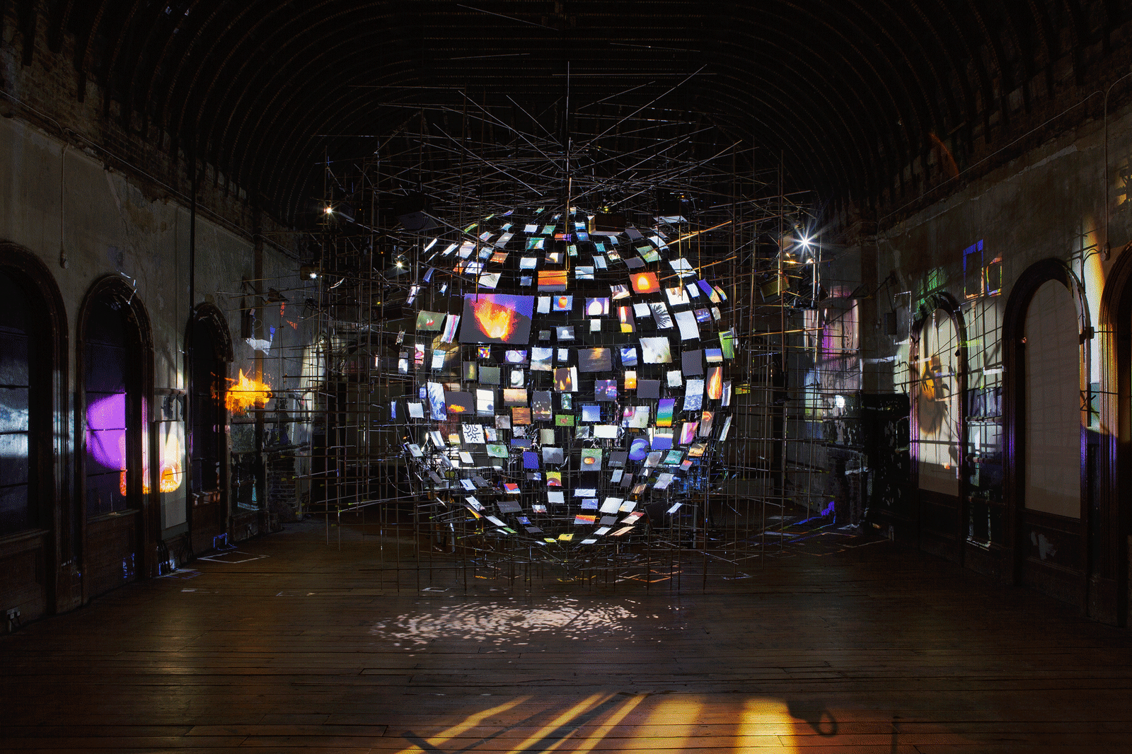 Sarah Sze,&nbsp;Metronome, 2023, Mixed media, projectors, paper, wood, stainless steel © Sarah Sze, Photograph: Thierry Bal &nbsp;